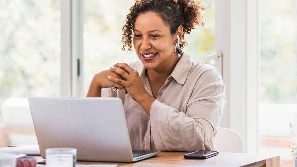 learner at home with laptop