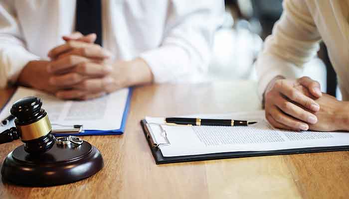 A married couple in a legal session