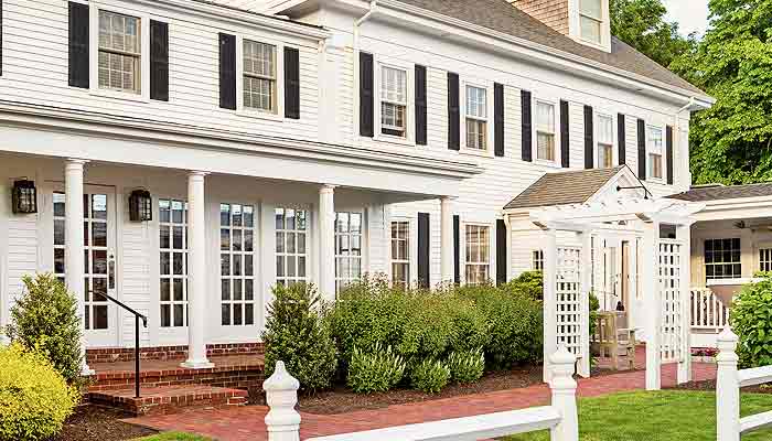 A house with a beautifully landscaped lawn