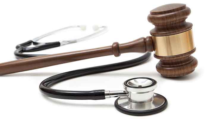 courtroom gavel and medical device