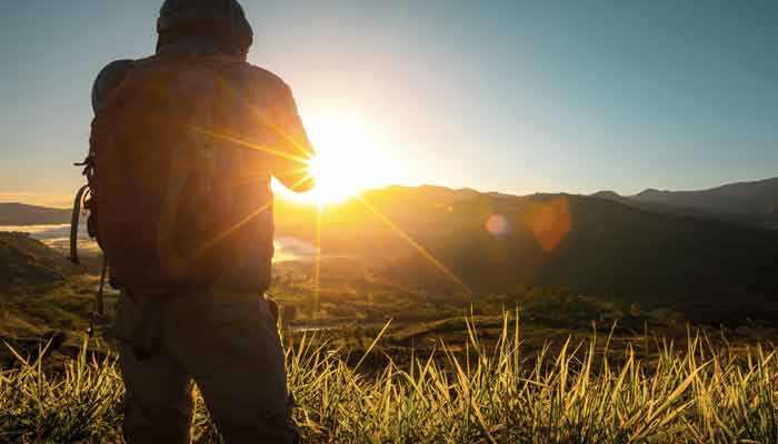 Photographer at sunset