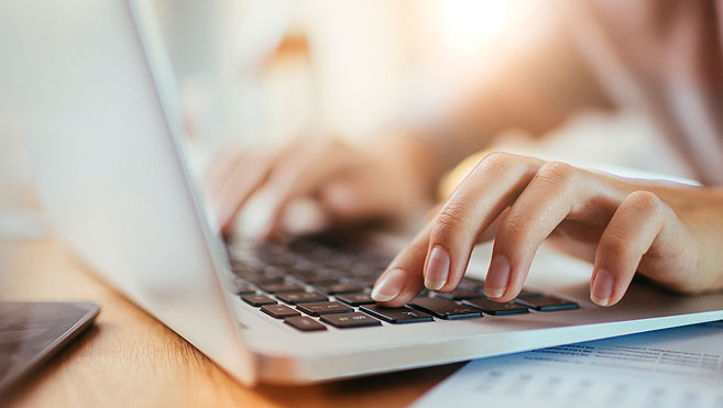 Writer working at their computer