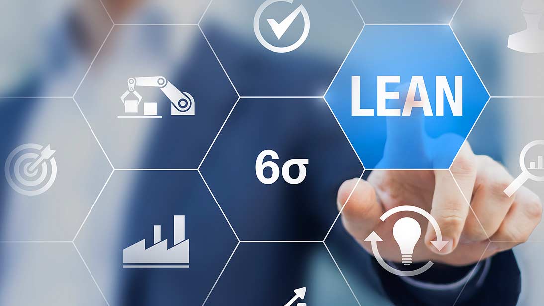 hand pointing to chart with six sigma symbols and themes